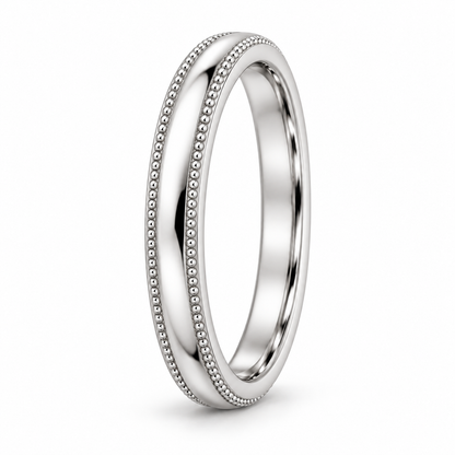 [metal:white-gold] Delphine Milgrain Band — three-quarter — Milgrain band, standing oblique studio view [catalog-v4]