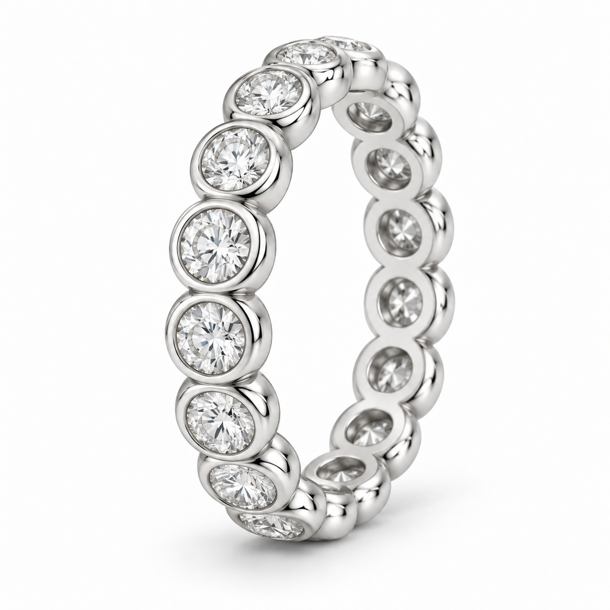 [metal:white-gold] Eloise Bezel Eternity Ring — three-quarter — Round diamond bezel eternity ring, standing oblique studio view [catalog-v4]