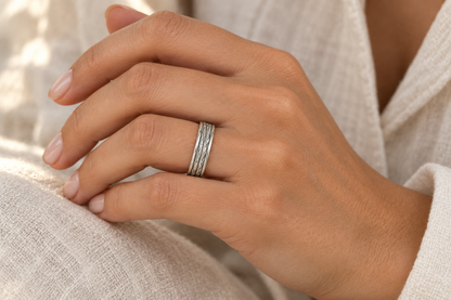 [metal:all] Elowen Textured Ring — worn — Human-worn styling illustration [catalog-v4]
