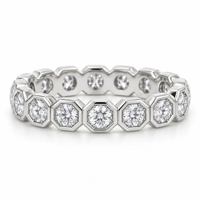 [metal:white-gold] Estrella Octagonal Bezel Eternity Ring — front — full eternity ring of round diamonds each within separate octagonal metal bezel, continuous linked sequence, front view [catalog-v4]