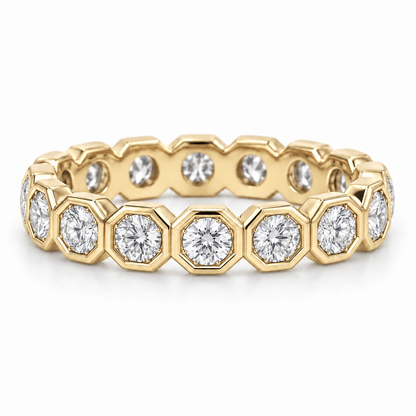 [metal:yellow-gold] Estrella Octagonal Bezel Eternity Ring — front — full eternity ring of round diamonds each within separate octagonal metal bezel, continuous linked sequence, front view [catalog-v4]