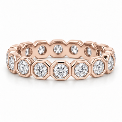 [metal:rose-gold] Estrella Octagonal Bezel Eternity Ring — front — full eternity ring of round diamonds each within separate octagonal metal bezel, continuous linked sequence, front view [catalog-v4]