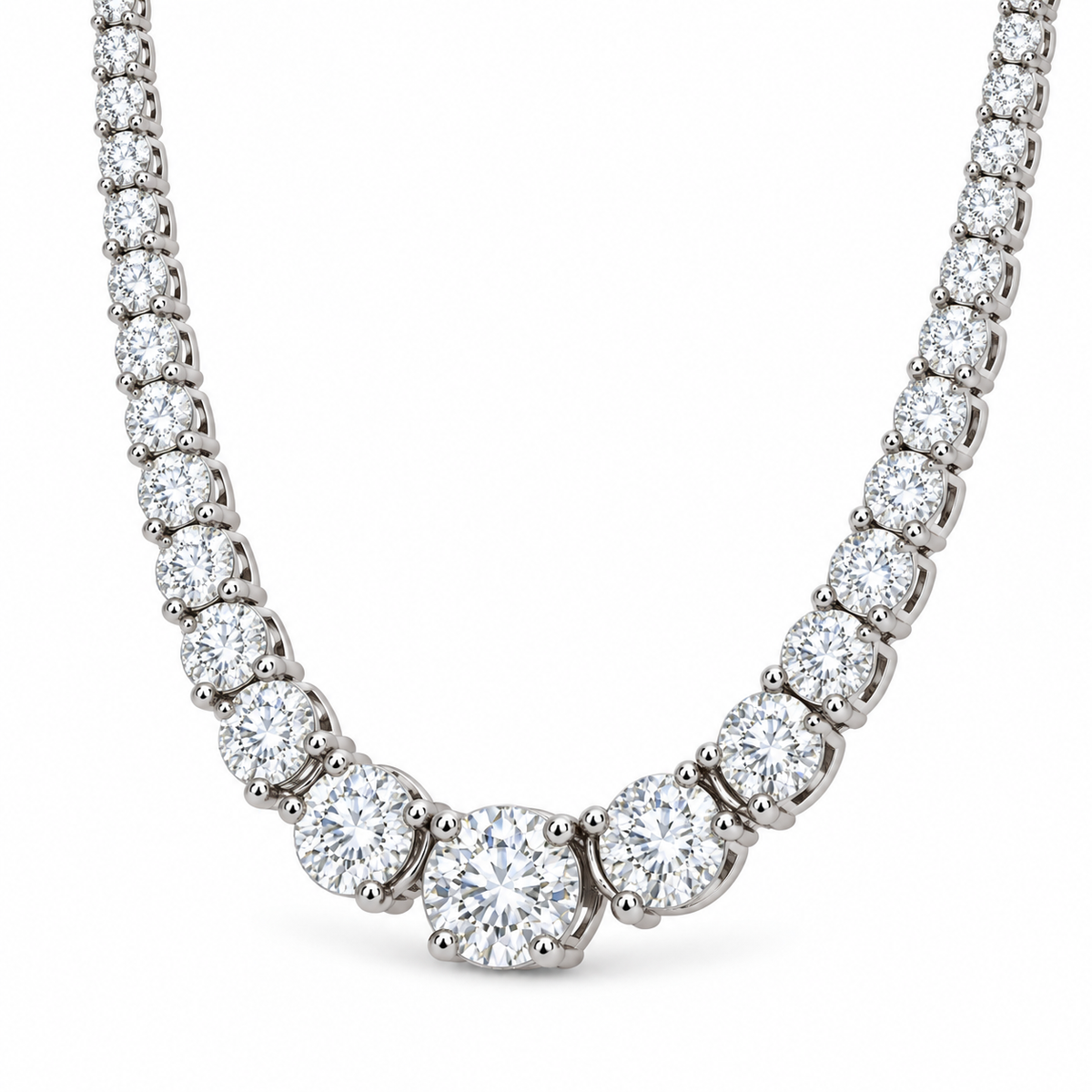 [metal:white-gold] Eternelle Tennis Necklace — three-quarter — Graduated round diamond necklace, oblique studio view [catalog-v4]