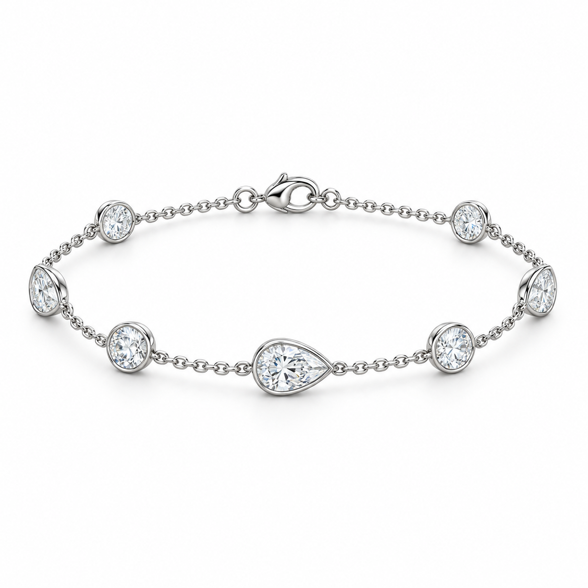 [metal:white-gold] Evangeline Station Bracelet — front — Alternating pear and round diamond station bracelet, low oblique studio view [catalog-v4]