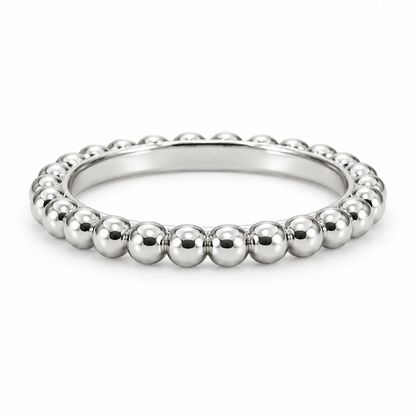 [metal:white-gold] Evelise Beaded Band — front — slim continuous band of evenly sized polished metal beads joined to a smooth inner ring, no stones, front view [catalog-v4]