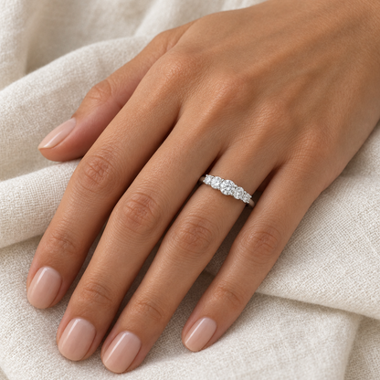 [metal:all] Felicite Five-Stone Ring — worn — Human-worn styling illustration [catalog-v4]