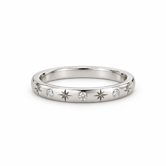 [metal:white-gold] Freya Celestial Ring — front — Star-engraved diamond band, shallow front studio view [catalog-v4]