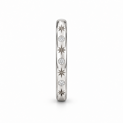 [metal:white-gold] Freya Celestial Ring — side-profile — Star-engraved diamond band, edge profile studio view [catalog-v4]
