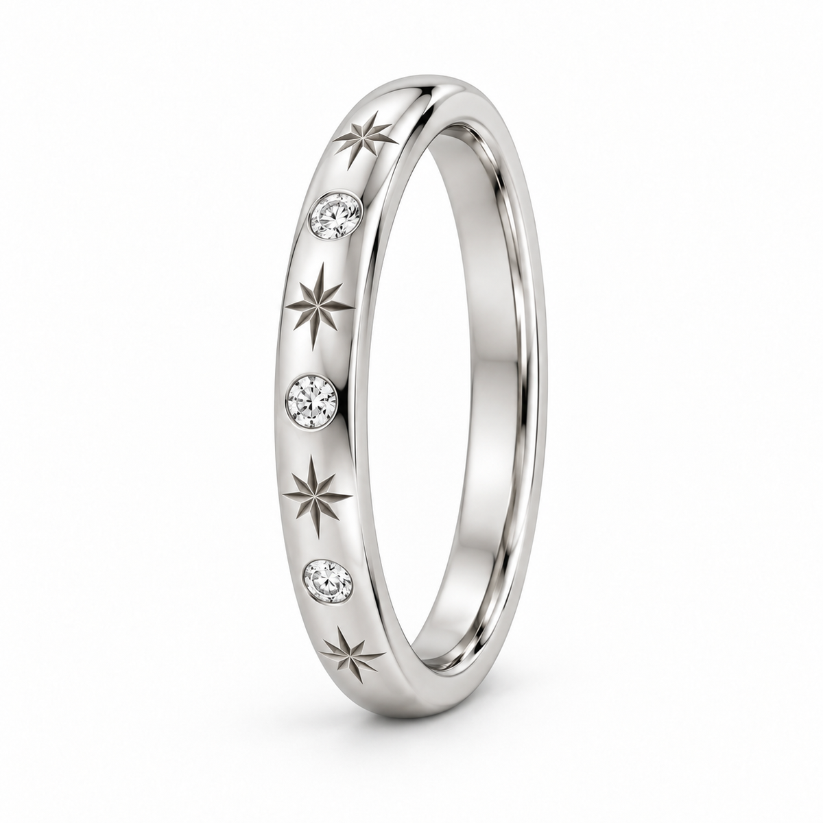 [metal:white-gold] Freya Celestial Ring — three-quarter — Star-engraved diamond band, standing oblique studio view [catalog-v4]