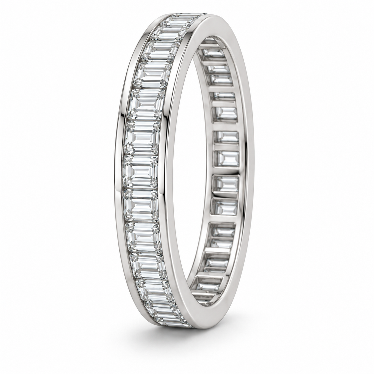 [metal:white-gold] Giselle Baguette Eternity Ring — three-quarter — Channel baguette eternity ring, standing oblique studio view [catalog-v4]