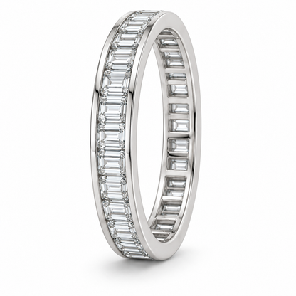 [metal:white-gold] Giselle Baguette Eternity Ring — three-quarter — Channel baguette eternity ring, standing oblique studio view [catalog-v4]