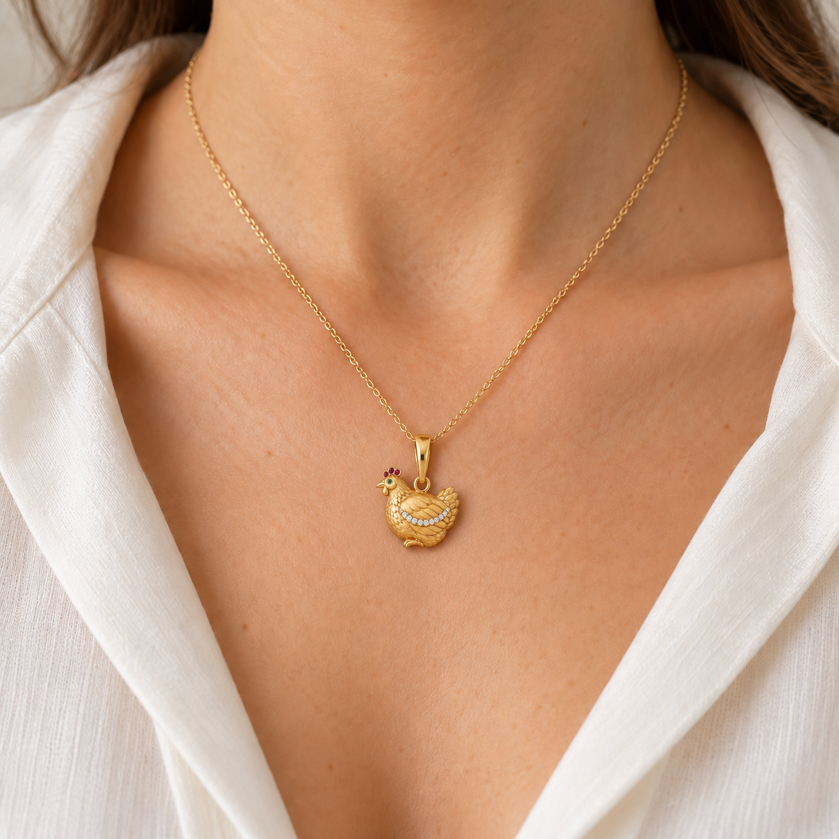 Grainne Chicken Pendant — worn view — [metal:all] — Model styling:19-inch (48.3 cm) chain; pendant sold separately