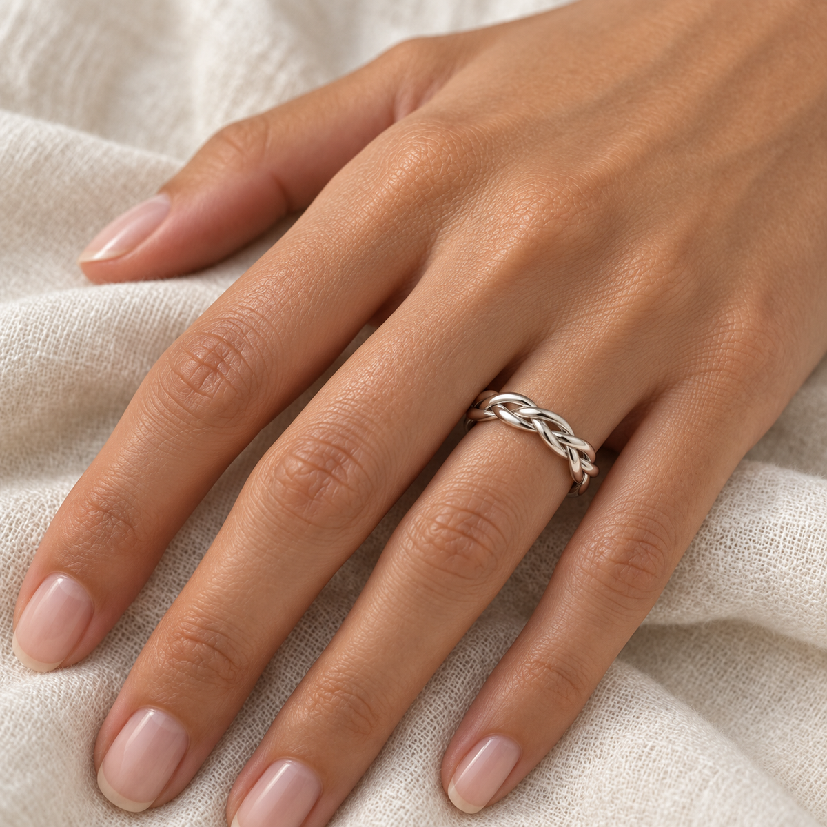 [metal:all] Hestia Braided Ring — worn — Human-worn styling illustration [catalog-v4]