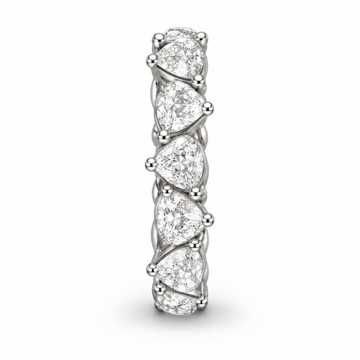 [metal:white-gold] Honora Pear Eternity Ring — side-profile — Alternating pear diamond eternity ring, edge profile studio view [catalog-v4]