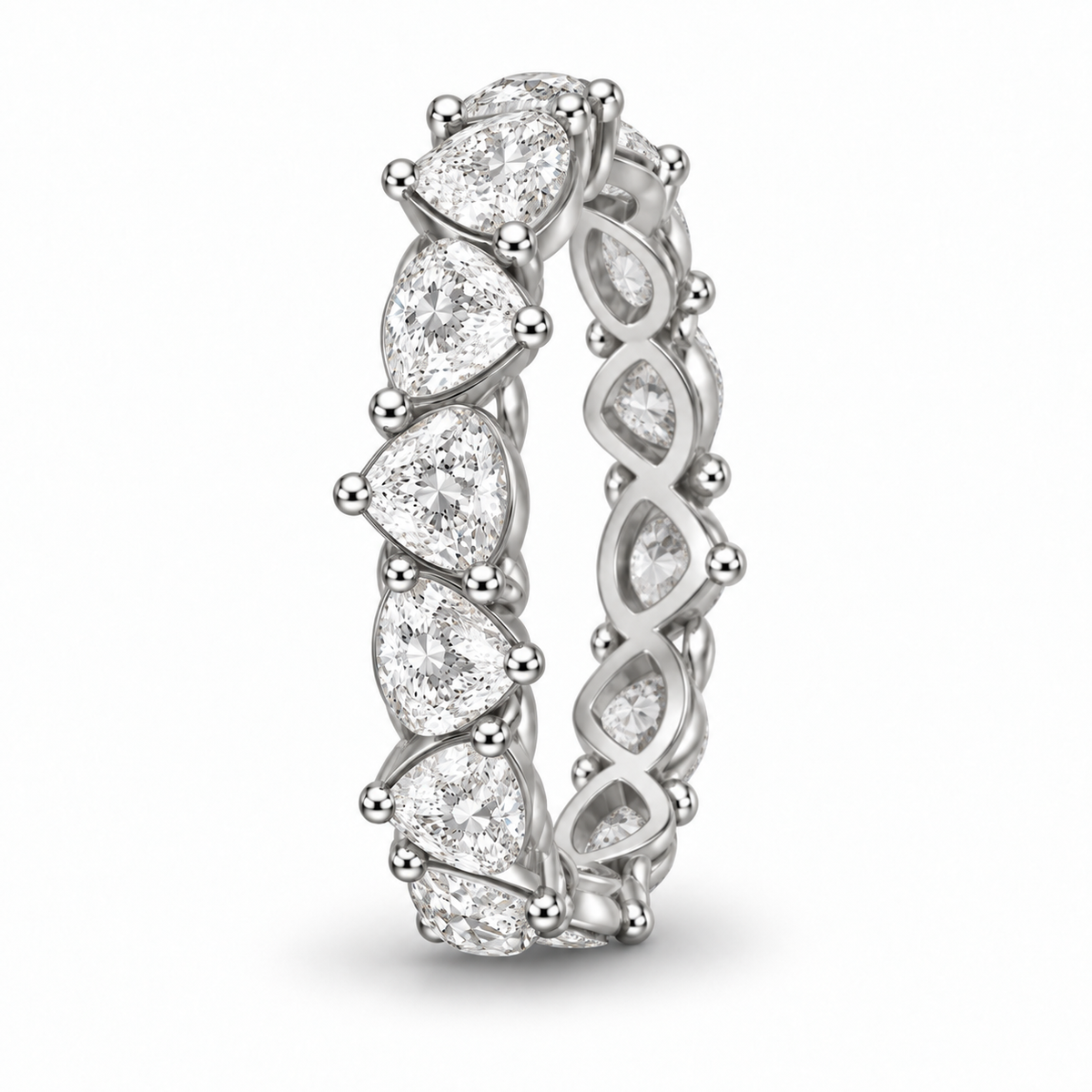 [metal:white-gold] Honora Pear Eternity Ring — three-quarter — Alternating pear diamond eternity ring, standing oblique studio view [catalog-v4]