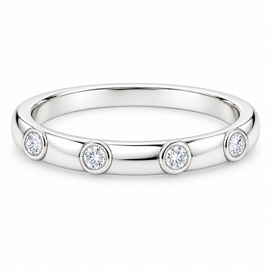 [metal:white-gold] Iliana Bezel Diamond Ring — front — Spaced round bezel diamond band, shallow front studio view [catalog-v4]