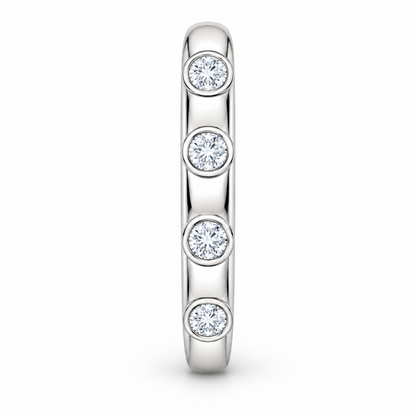 [metal:white-gold] Iliana Bezel Diamond Ring — side-profile — Spaced round bezel diamond band, edge profile studio view [catalog-v4]
