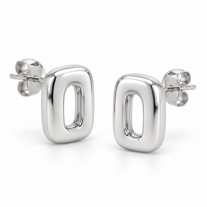 [metal:white-gold] Ilorine Arc-Window Studs — three-quarter — Same design shown three quarter [catalog-v4]