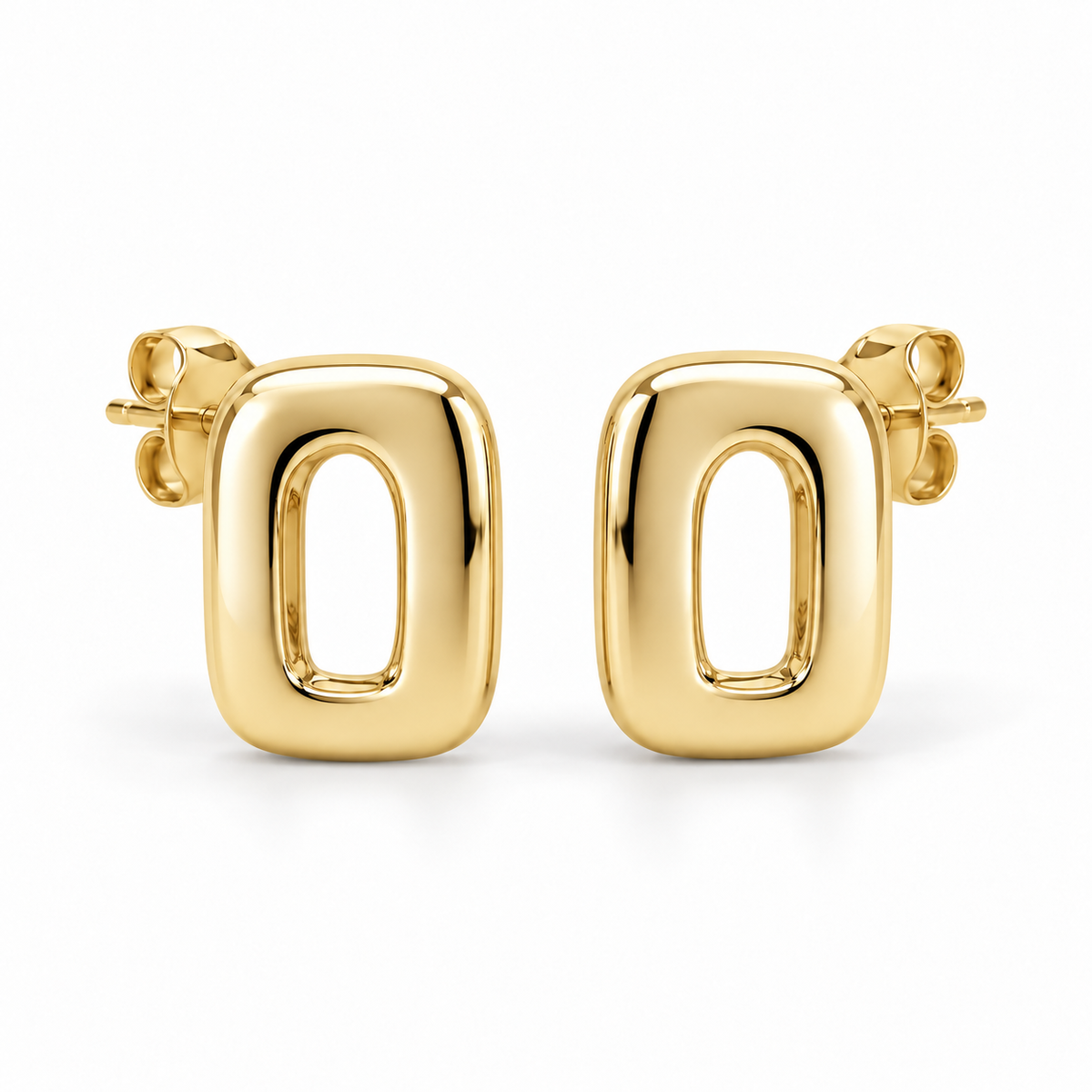 [metal:yellow-gold] Ilorine Arc-Window Studs — front — Matching pair of small thick polished rounded-rectangle metal studs, each has one narrow curved arch-shaped open window through centre. Smooth solid outer perimeter, straight rear posts and butterfly backs. No stones. [catalog-v4]