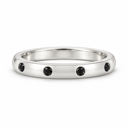 [metal:white-gold] Ione Black Diamond Ring — front — Flush-set black diamond band, shallow front studio view [catalog-v4]