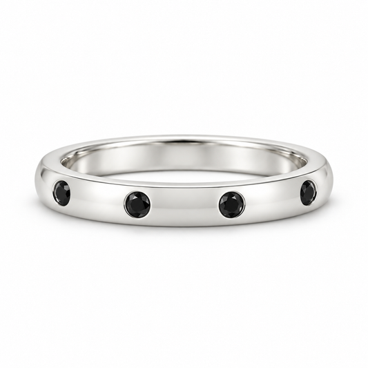[metal:white-gold] Ione Black Diamond Ring — front — Flush-set black diamond band, shallow front studio view [catalog-v4]