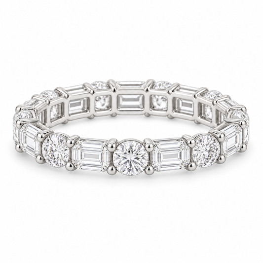 [metal:white-gold] Iris Mixed-Cut Eternity Ring — front — Mixed-cut diamond eternity ring, shallow front studio view [catalog-v4]