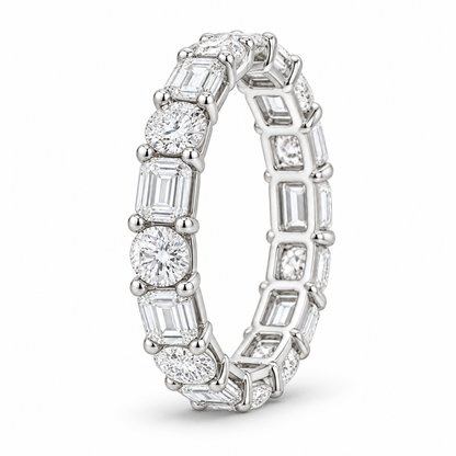 [metal:white-gold] Iris Mixed-Cut Eternity Ring — three-quarter — Mixed-cut diamond eternity ring, standing oblique studio view [catalog-v4]
