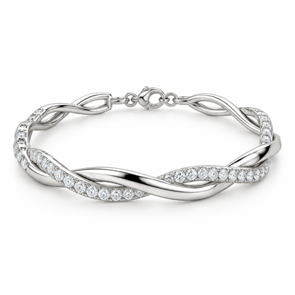 [metal:white-gold] Isadora Twist Bracelet — front — Intertwined polished and pavé bracelet, low oblique studio view [catalog-v4]