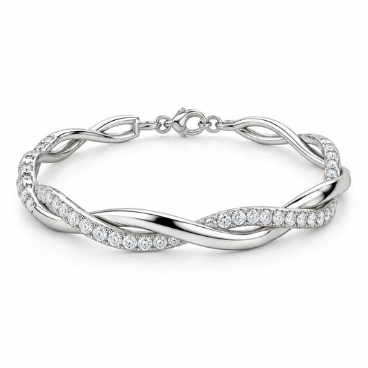 [metal:white-gold] Isadora Twist Bracelet — front — Intertwined polished and pavé bracelet, low oblique studio view [catalog-v4]