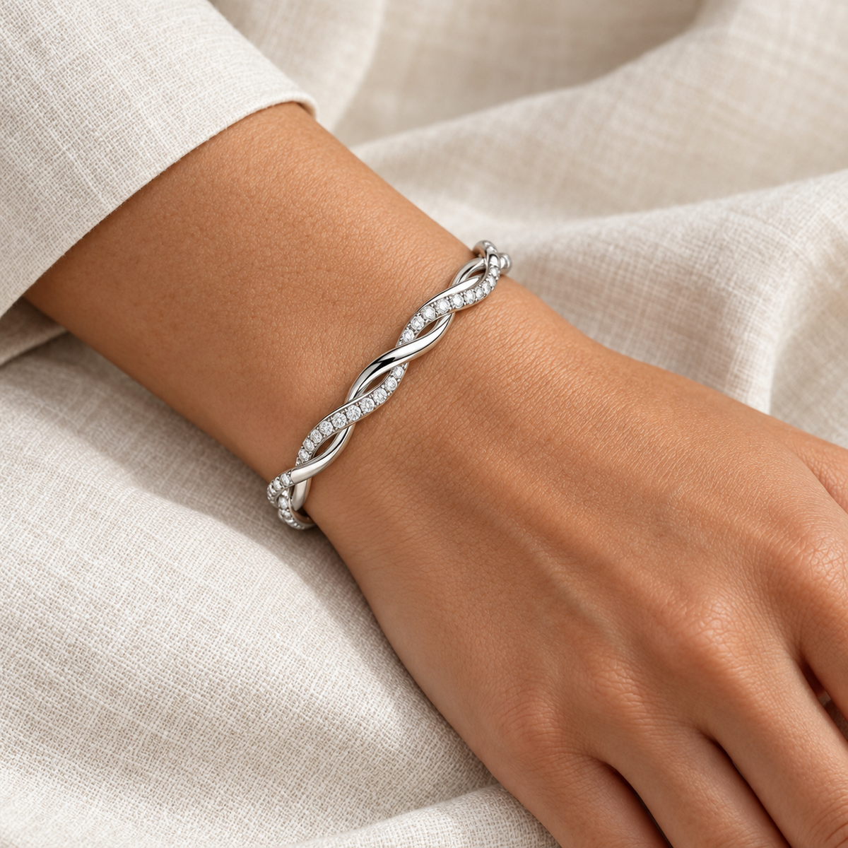 [metal:all] Isadora Twist Bracelet — worn — Human-worn styling illustration [catalog-v4]