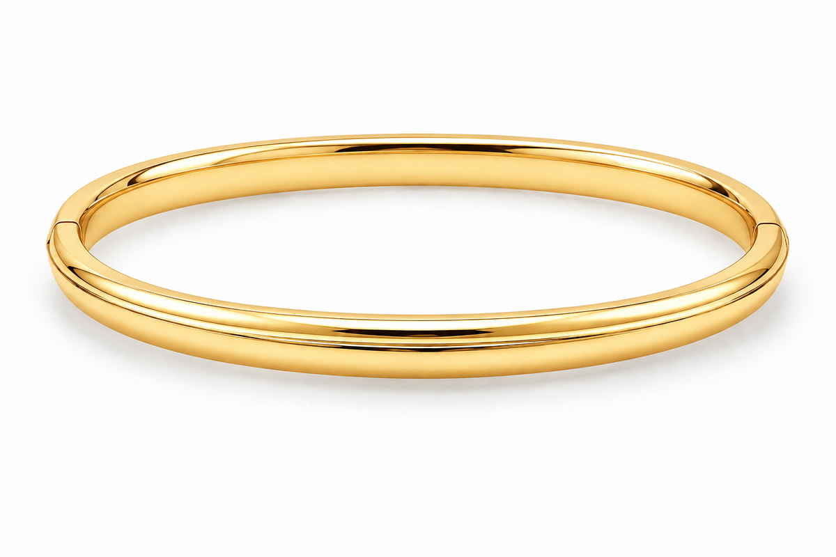 [metal:yellow-gold] Isola Hinged Oval Bangle — front — plain polished oval hinged bangle with a subtle raised centre ridge and hidden clasp, no stones, front view [catalog-v4]