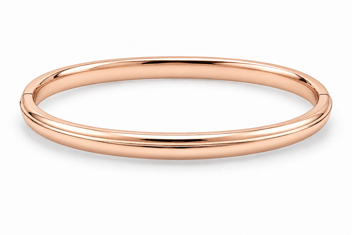 [metal:rose-gold] Isola Hinged Oval Bangle — front — plain polished oval hinged bangle with a subtle raised centre ridge and hidden clasp, no stones, front view [catalog-v4]