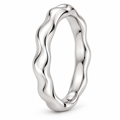 [metal:white-gold] Juliette Sculpted Band — three-quarter — Gently undulating band, standing oblique studio view [catalog-v4]