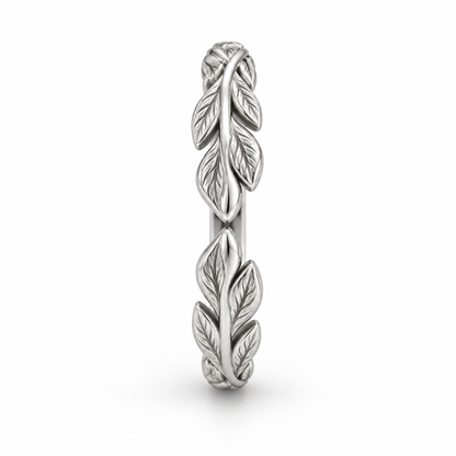 [metal:white-gold] Juniper Laurel Ring — side-profile — Open engraved laurel-leaf band, edge profile studio view [catalog-v4]