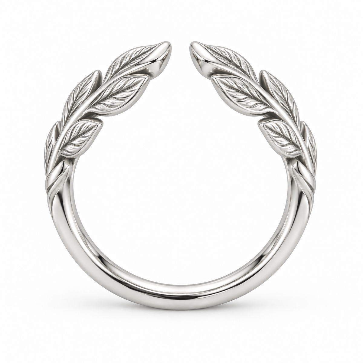 [metal:white-gold] Juniper Laurel Ring — top — Open engraved laurel-leaf band, circular elevation studio view [catalog-v4]