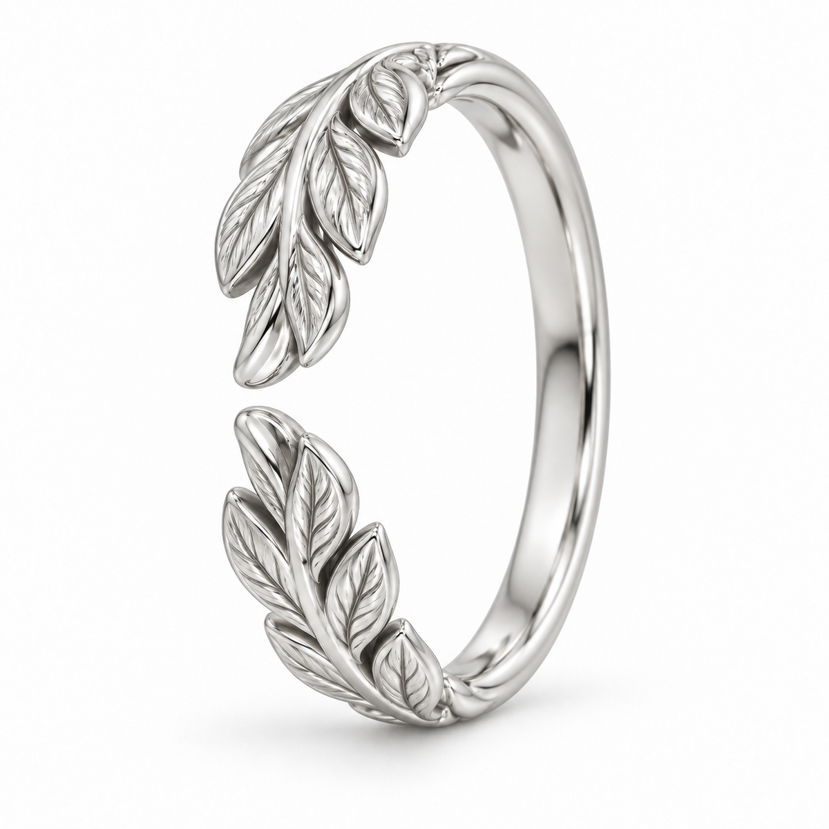 [metal:white-gold] Juniper Laurel Ring — three-quarter — Open engraved laurel-leaf band, standing oblique studio view [catalog-v4]