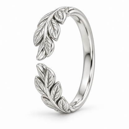 [metal:white-gold] Juniper Laurel Ring — three-quarter — Open engraved laurel-leaf band, standing oblique studio view [catalog-v4]