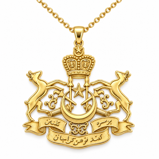 Kelantan Emblem Pendant — front, yellow gold; any chain shown is an optional styling accessory