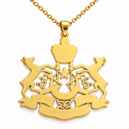 Kelantan Emblem Pendant — plain reverse angle, yellow gold; any chain shown is an optional styling accessory