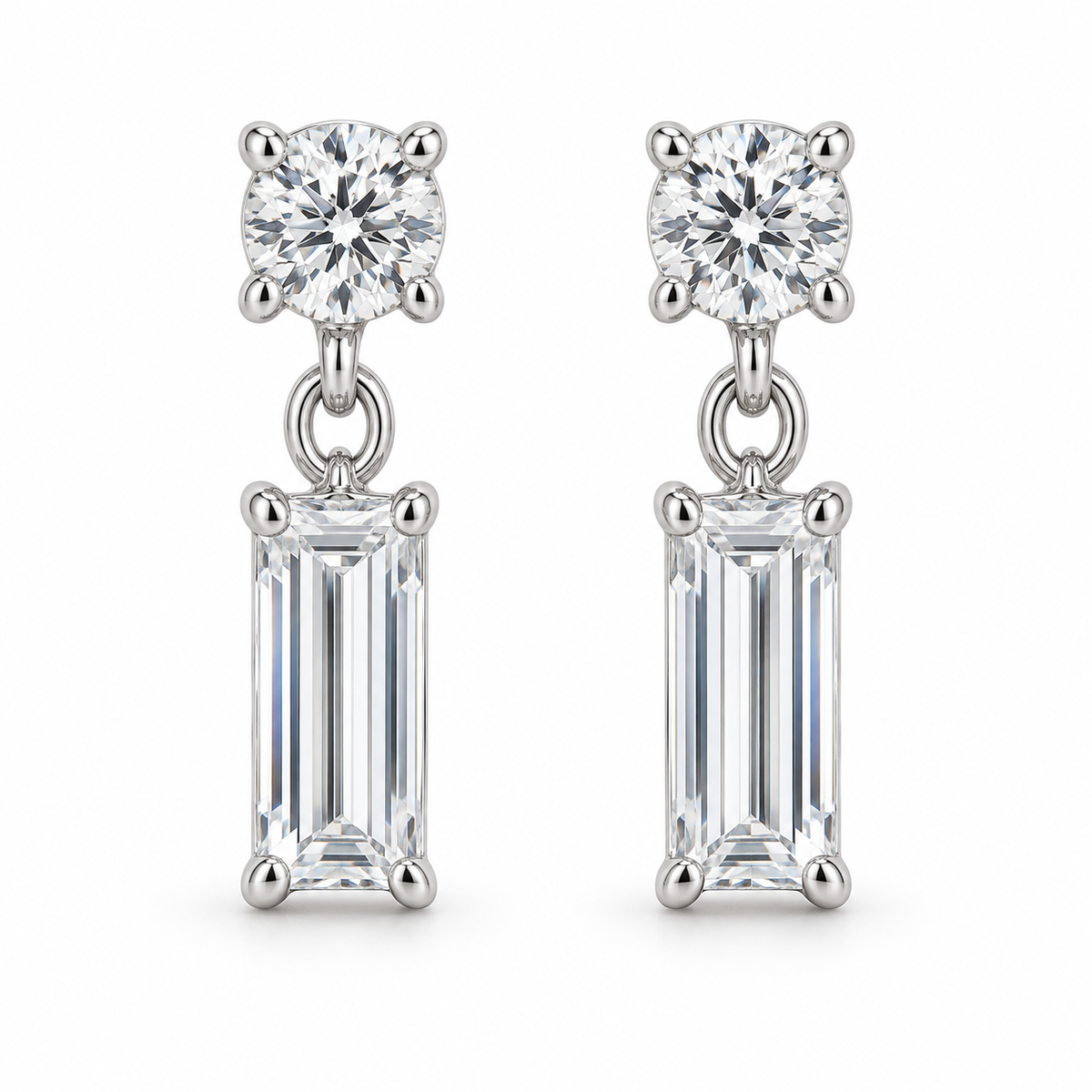 [metal:white-gold] Leonie Baguette Drop Earrings — front — one small round diamond stud above one vertical baguette diamond drop on each earring, front view [catalog-v4]