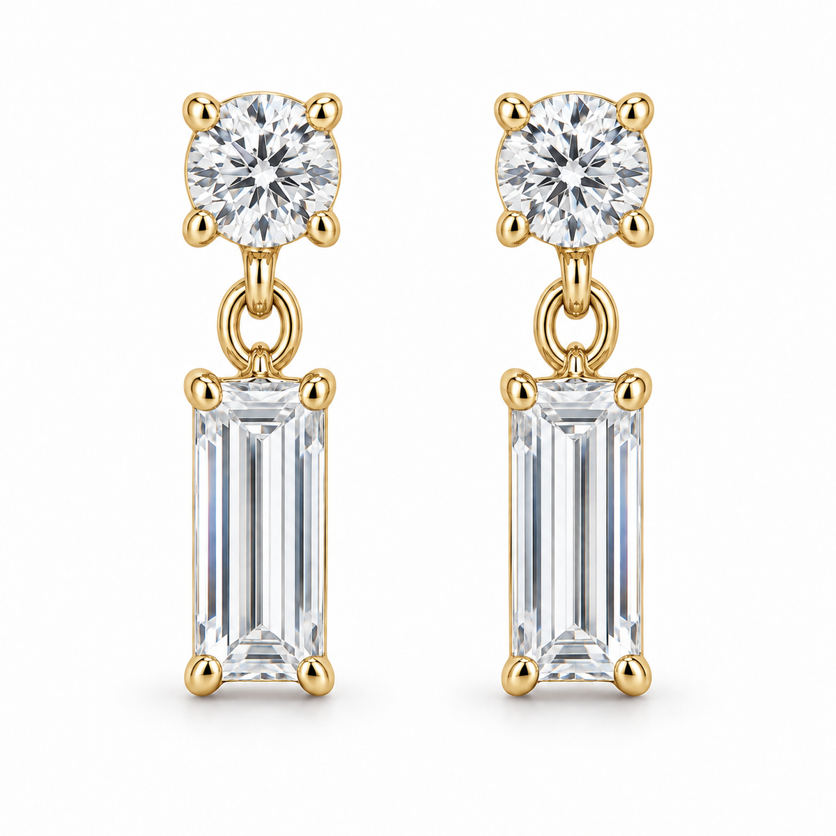 [metal:yellow-gold] Leonie Baguette Drop Earrings — front — one small round diamond stud above one vertical baguette diamond drop on each earring, front view [catalog-v4]