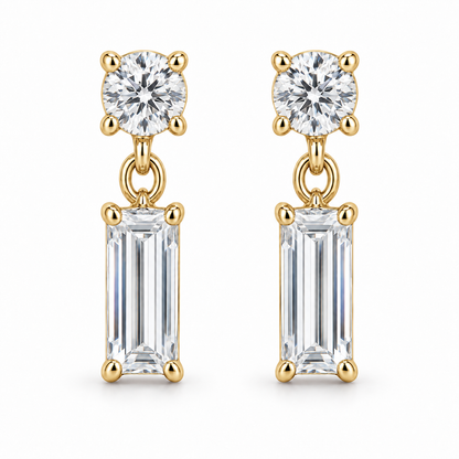 [metal:yellow-gold] Leonie Baguette Drop Earrings — front — one small round diamond stud above one vertical baguette diamond drop on each earring, front view [catalog-v4]