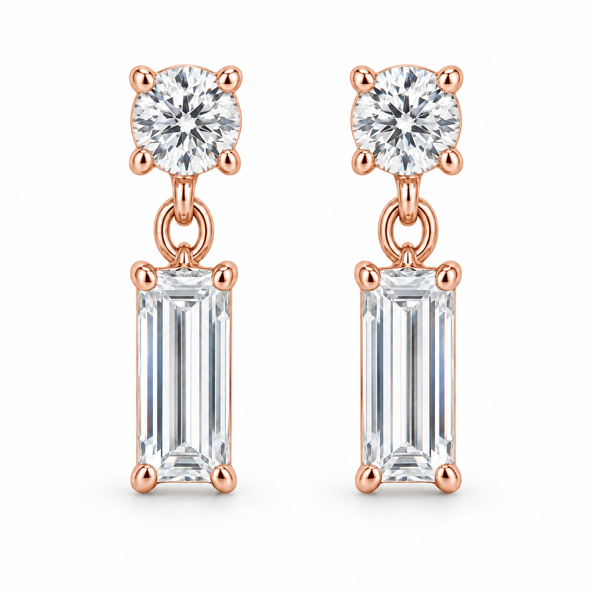[metal:rose-gold] Leonie Baguette Drop Earrings — front — one small round diamond stud above one vertical baguette diamond drop on each earring, front view [catalog-v4]