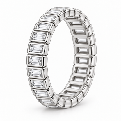 [metal:white-gold] Linnea Baguette Ladder Eternity Ring — three-quarter — full eternity ring of north-south narrow baguette diamonds in individual slim rectangular bezels linked all around, three-quarter view [catalog-v4]