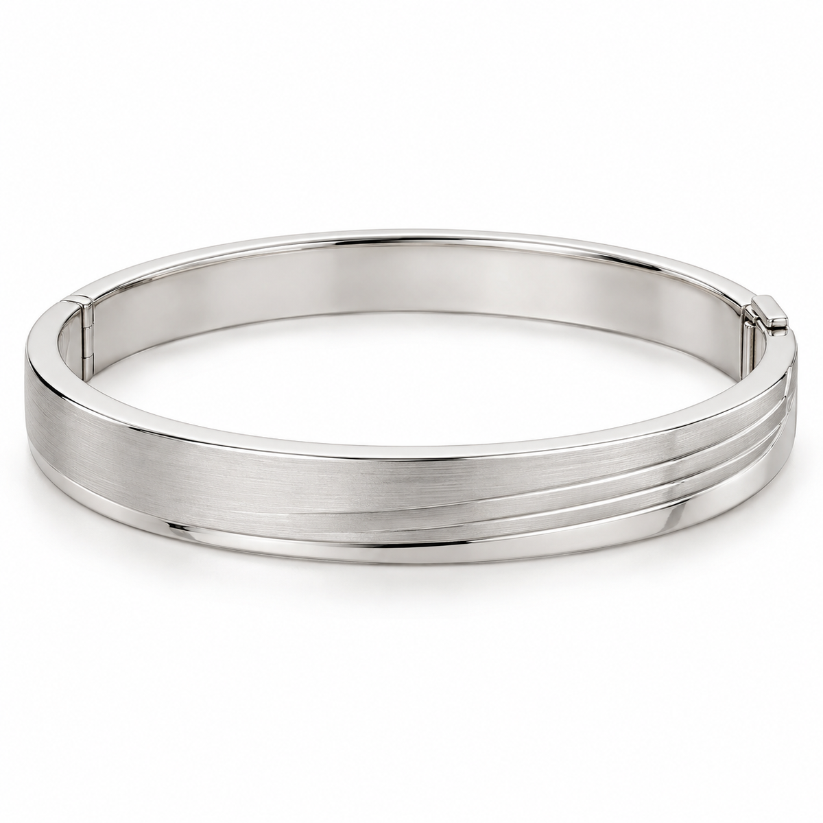 [metal:white-gold] Lorisse Offset-Step Bangle — front — Closed oval hinged bangle, broad flat satin top with three shallow parallel stepped terraces offset toward one edge, polished smooth borders, discreet side hinge and opposite box clasp. Steps are metal surface levels, not multiple separate bangle bands. No stones. [catalog-v4]