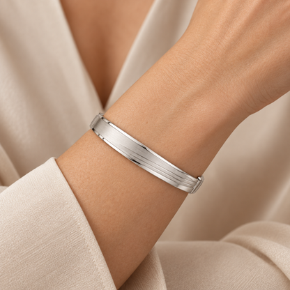 [metal:white-gold] Lorisse Offset-Step Bangle — worn — Same design shown worn [catalog-v4]