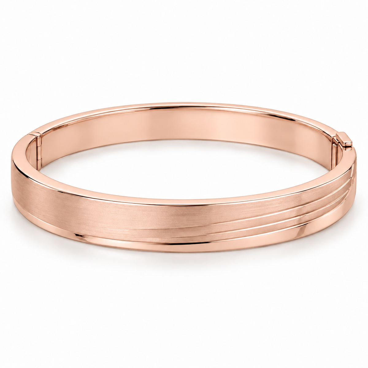 [metal:rose-gold] Lorisse Offset-Step Bangle — front — Closed oval hinged bangle, broad flat satin top with three shallow parallel stepped terraces offset toward one edge, polished smooth borders, discreet side hinge and opposite box clasp. Steps are metal surface levels, not multiple separate bangle bands. No stones. [catalog-v4]