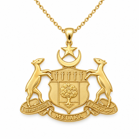 Melaka Emblem Pendant — front, yellow gold; any chain shown is an optional styling accessory