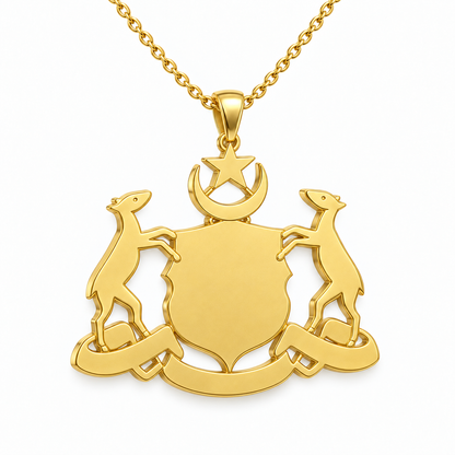 Melaka Emblem Pendant — plain reverse angle, yellow gold; any chain shown is an optional styling accessory