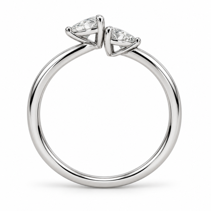 [metal:white-gold] Maribel Pear Duo Ring — top — slender open polished ring with two modest pear diamonds at opposing tips, one pear points up other down, top view [catalog-v4]